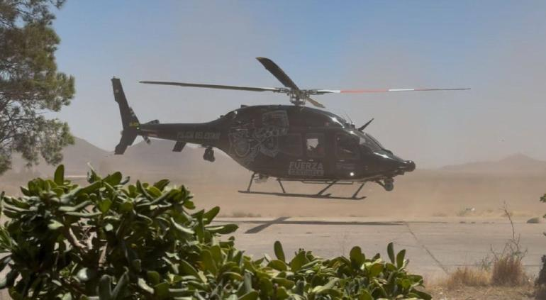 Realizan operativo aéreo para frenar incendio forestal en Madera